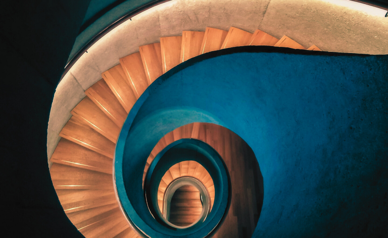 Breaking relationship patterns represented by a repeating spiral staircase